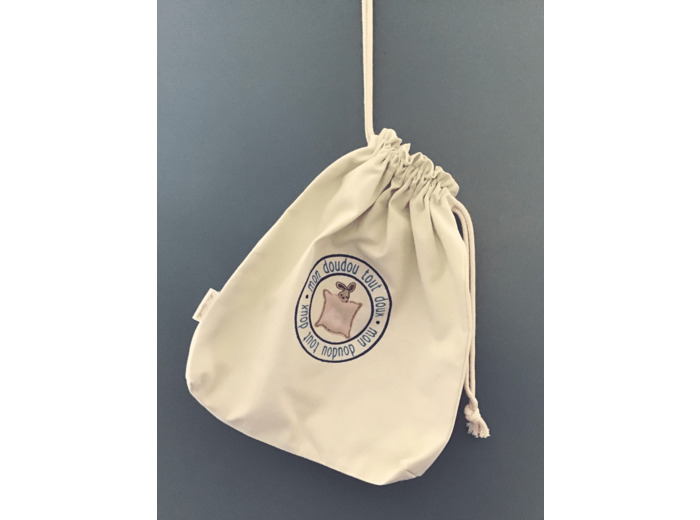 Sac brodé, deux cordons.