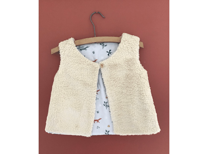 Gilet berger réversible en fausse fourrure beige et tissu animaux de la forêt