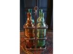 Casier à bouteilles vintage garni de 4 bouteilles anciennes en verre coloré