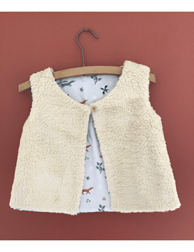 Gilet berger réversible en fausse fourrure beige et tissu animaux de la forêt