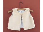 Gilet berger réversible en fausse fourrure et tissu coton petits cerfs sur fond blanc .